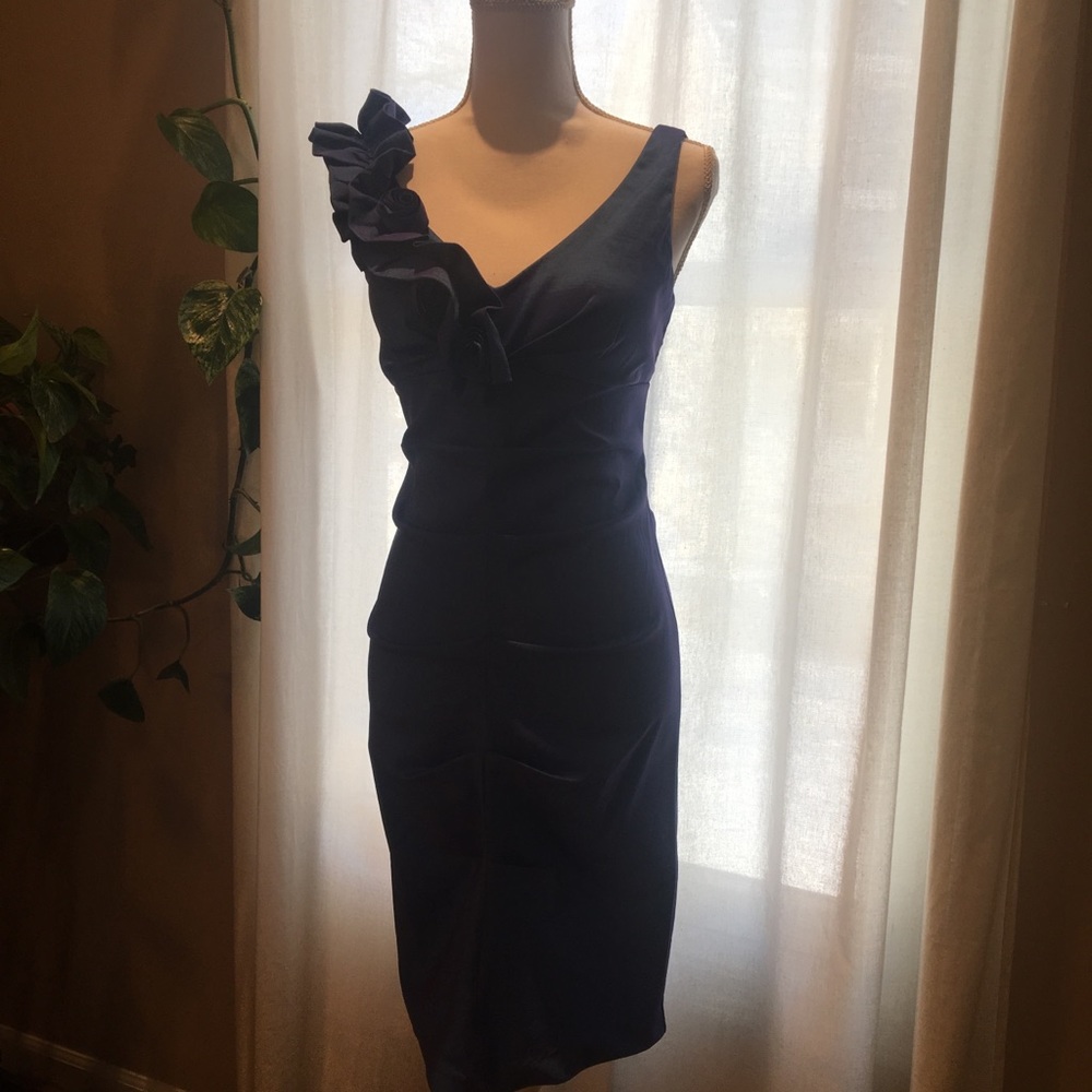 Shimmery blue ruched dress w/ shoulder detailing.